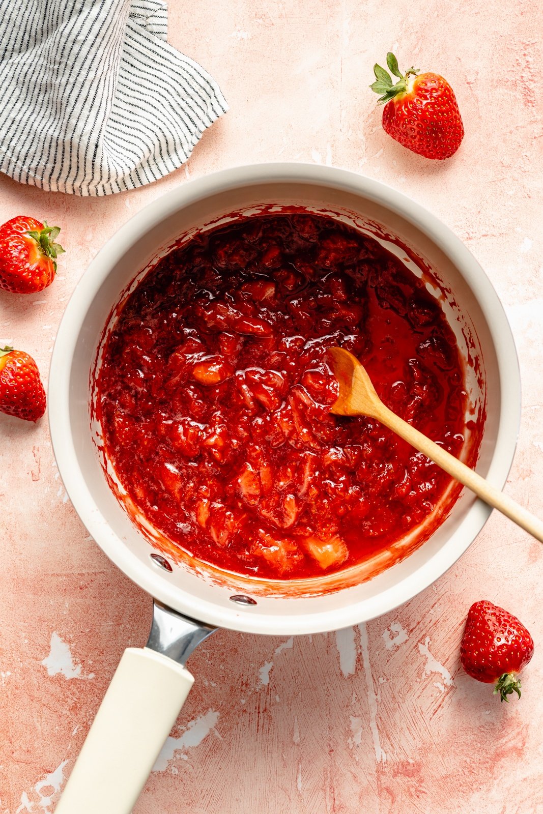 making a strawberry syrup for a berry chantilly latte