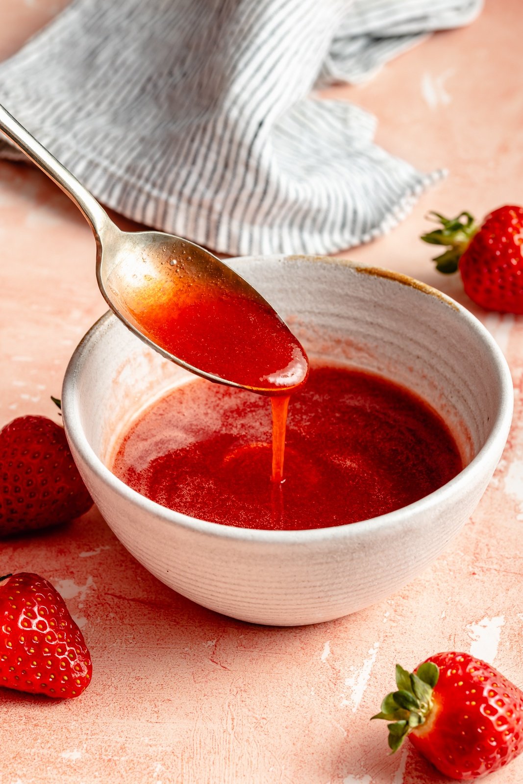 strawberry syrup in a small bowl