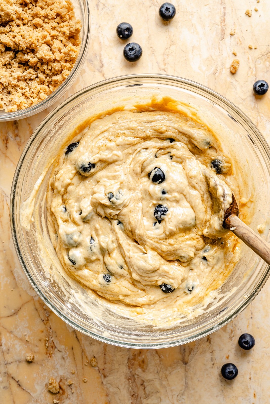 mixing batter for brown butter blueberry coffee cake