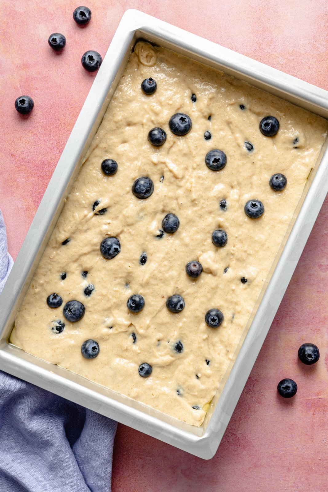 unbaked blueberry breakfast cake in a pan