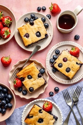 slices of protein breakfast cake with blueberries on plates