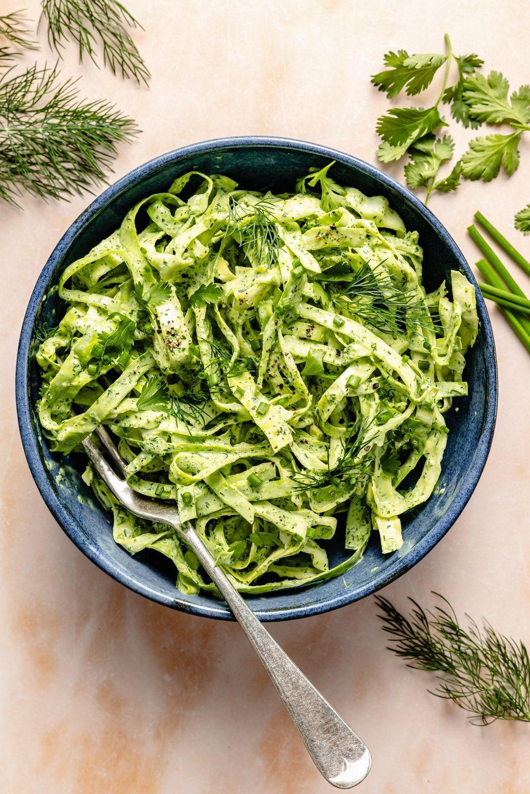 herby ranch slaw in a bowl to add to buffalo chicken smashed tacos