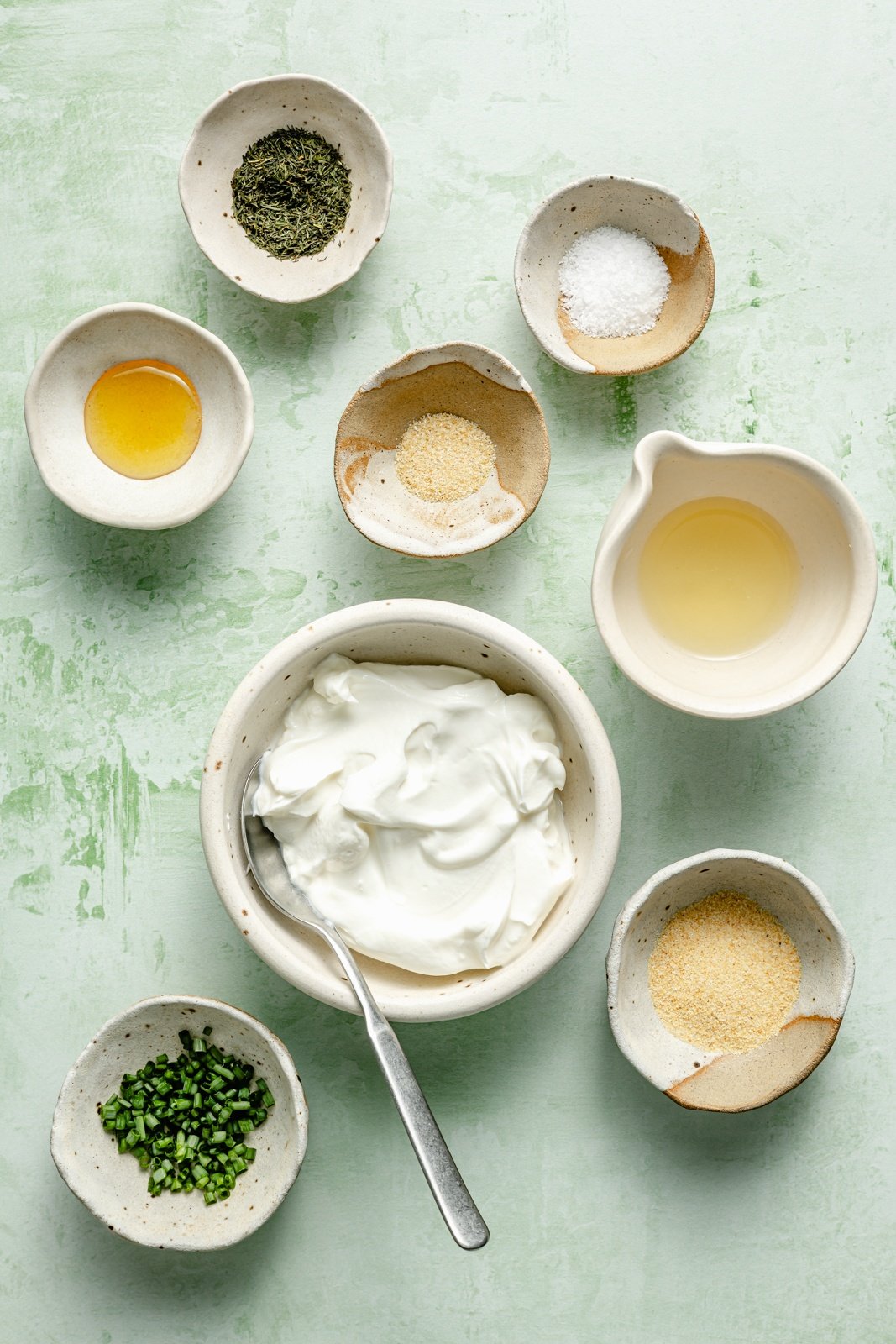 ingredients for Greek yogurt ranch dressing in bowls