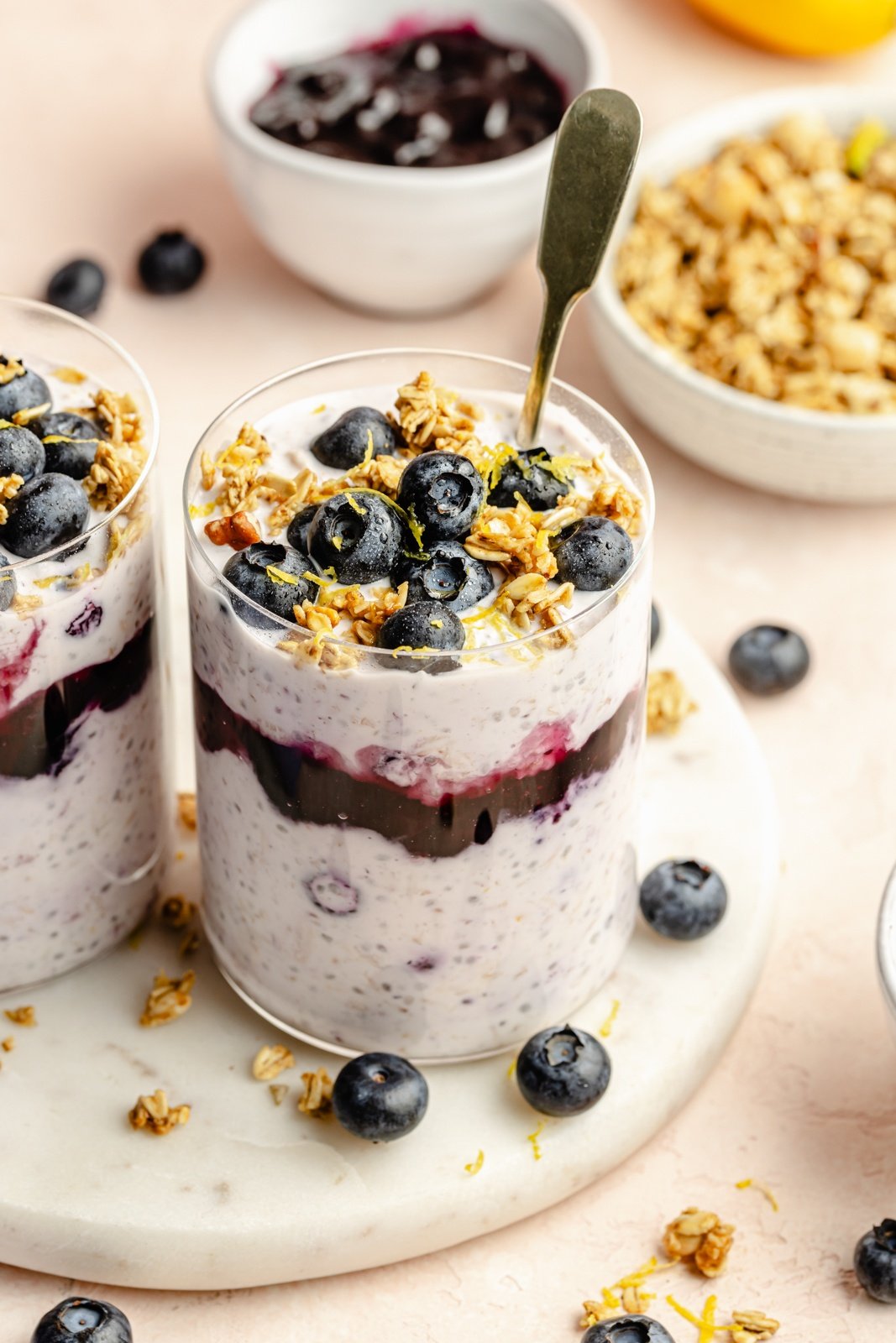 blueberry lemon overnight oats in a jar topped with blueberries