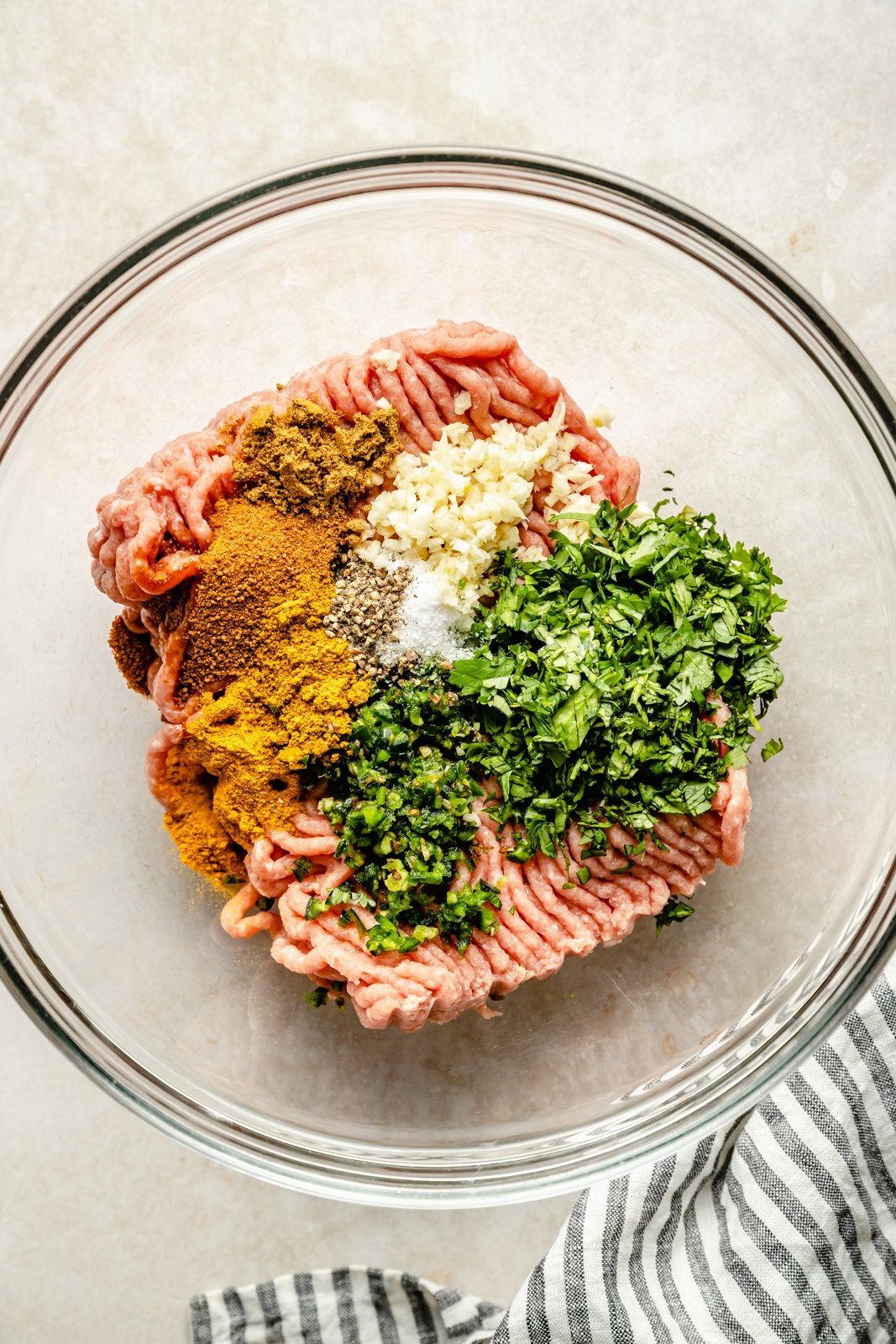 ingredients for curry turkey burgers in a bowl