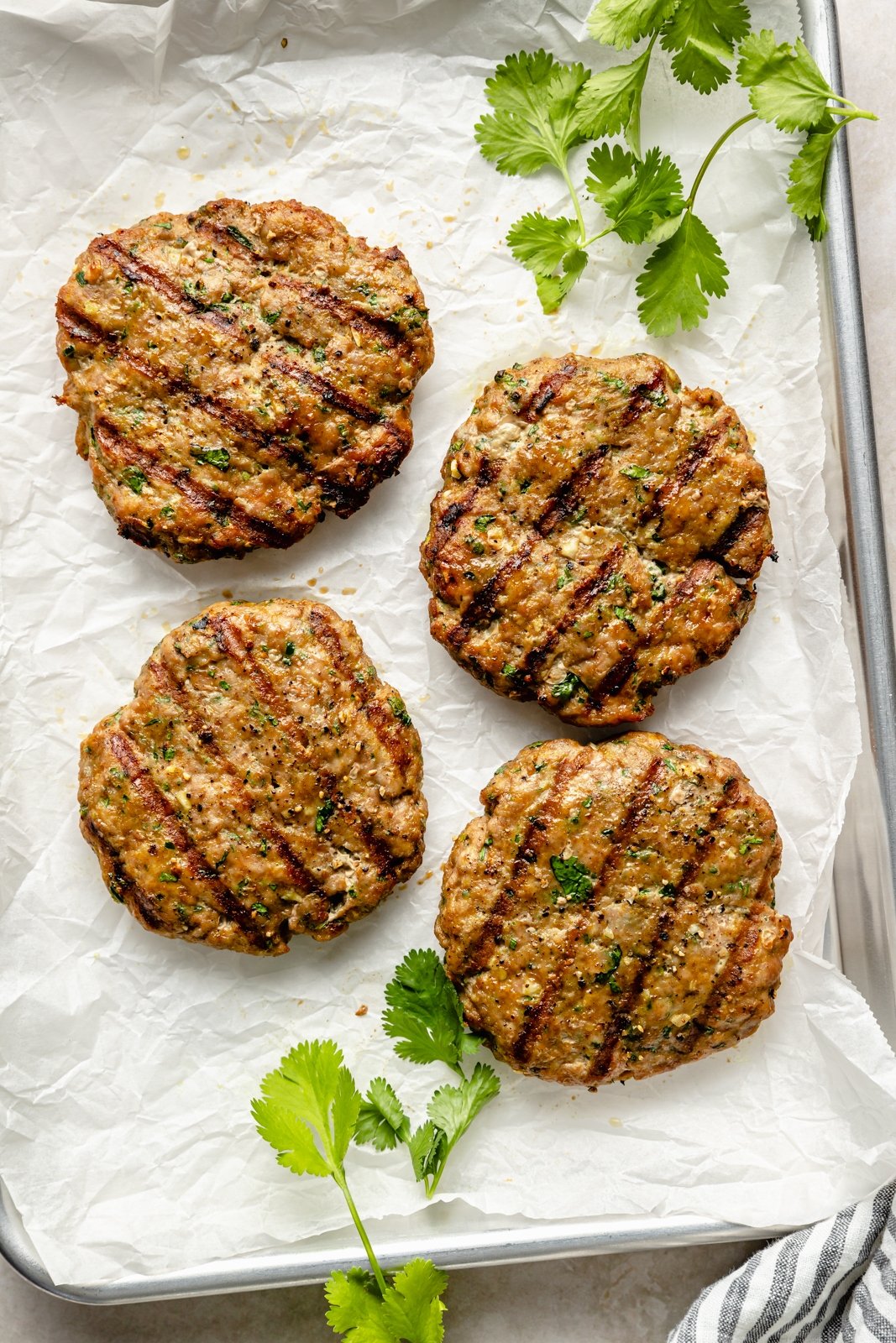 jalapeño turkey burgers on a baking sheet