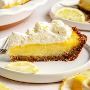 slice of lemon cream pie on a plate