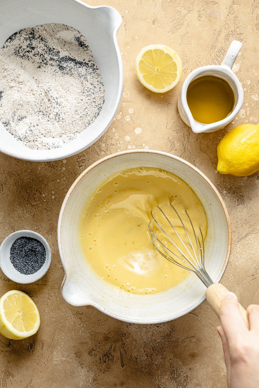 mixing batter for healthy lemon poppy seed muffins