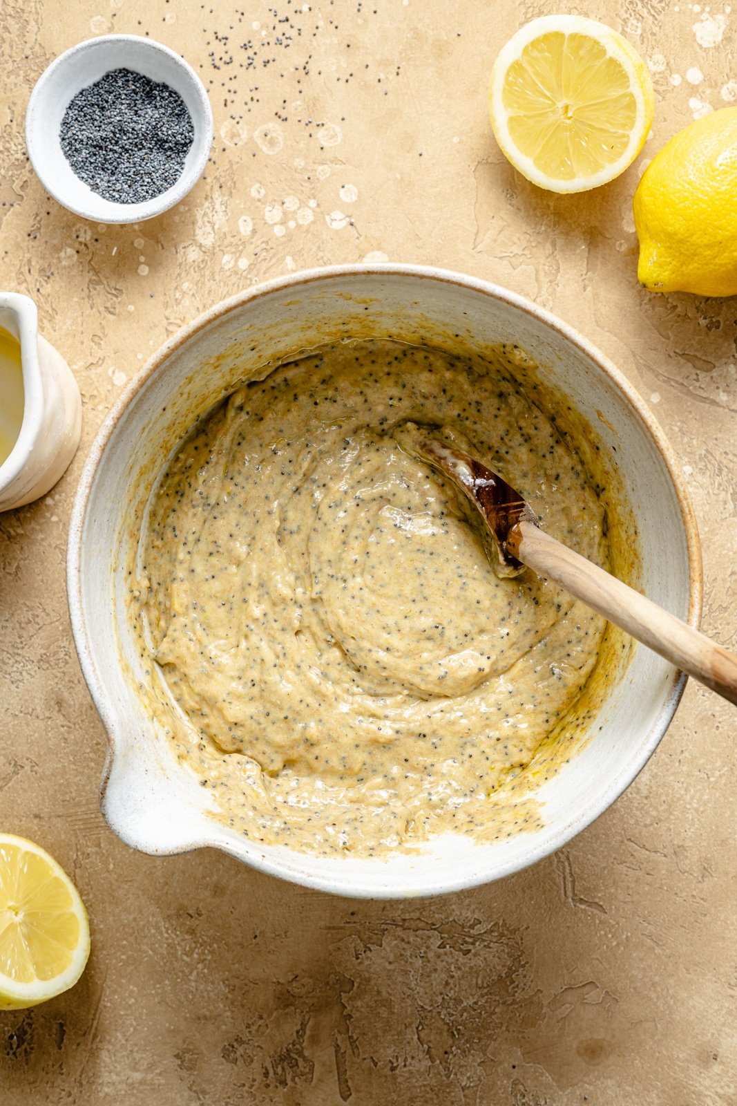 mixing batter for healthy lemon poppy seed muffins