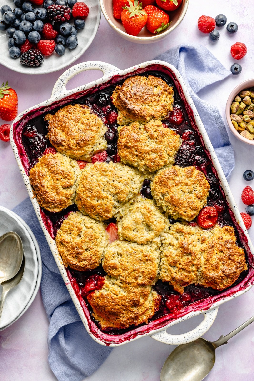 mixed berry cobbler in a baking pan