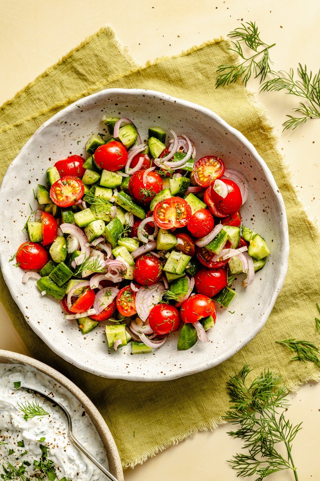 tomato cucumber salad in a bowl