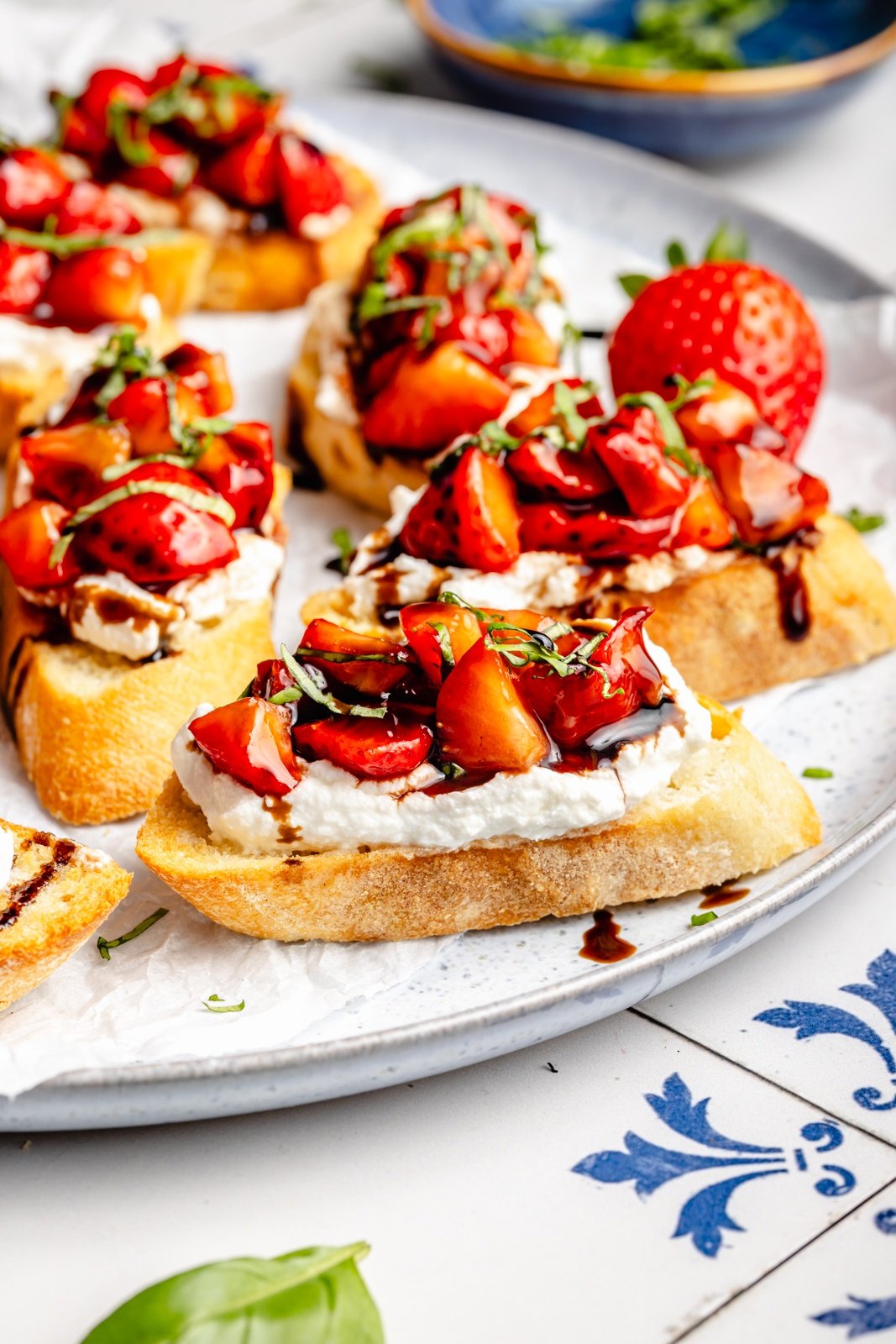 strawberry balsamic bruschetta with ricotta on a plate