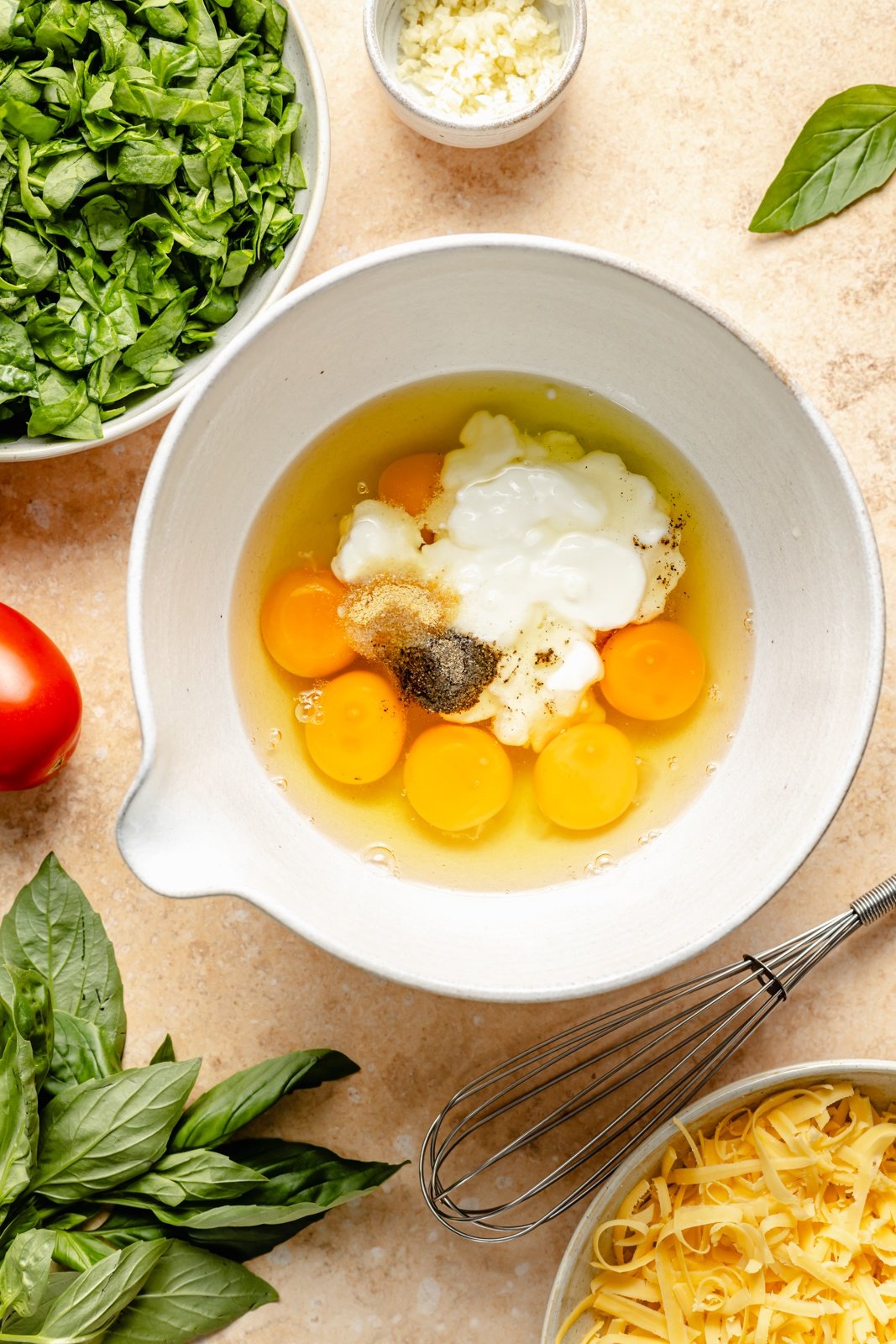ingredients in a bowl to make a tortilla quiche