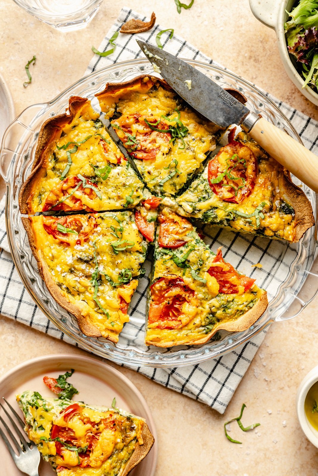 tomato basil tortilla quiche sliced in a pie pant