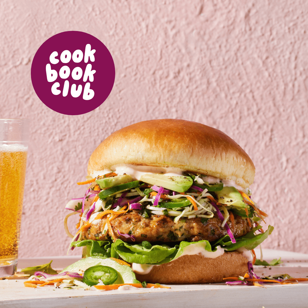 chile basil lime burger with a cookbook club logo over the top